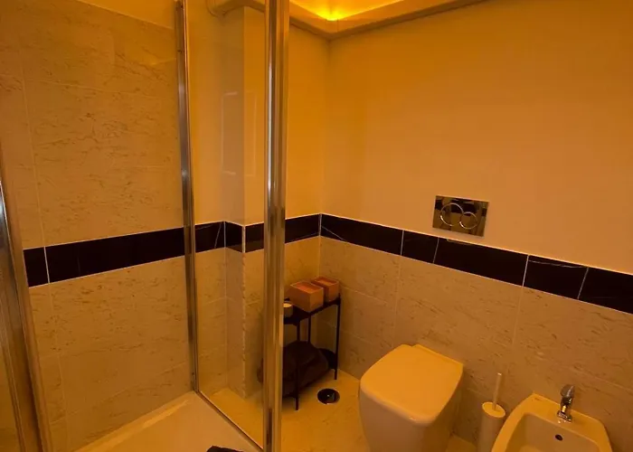 Joivy Exclusive 2-bedroom With Private Garden - 5 Minutes From The Colosseum *